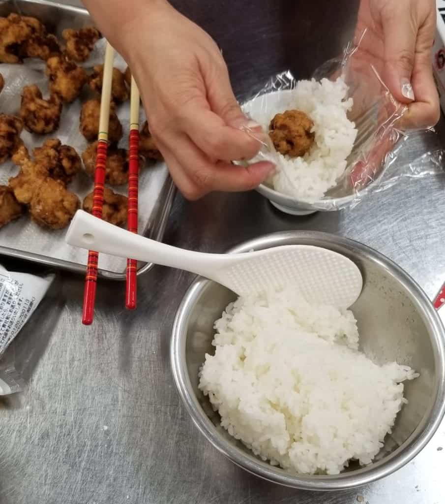 Making onigiri by hand