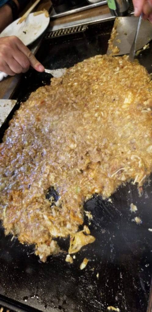 Monja or monjayaki is a Tokyo dish and this is the point where you dig in!