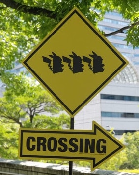 Road sign with Pikachu crossing